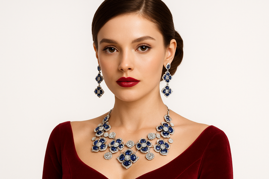 Vibia - Necklace and Earrings  White Gold( 18k) with white Diamonds and Imperial Blue Sapphires.