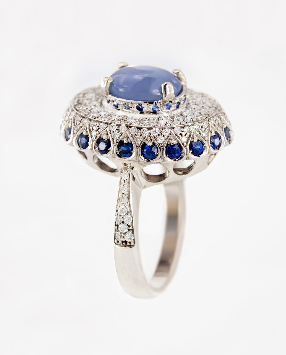 Claudia - White Gold (18K), with star natural sapphire center stone (imperial blue), and naturals diamonds