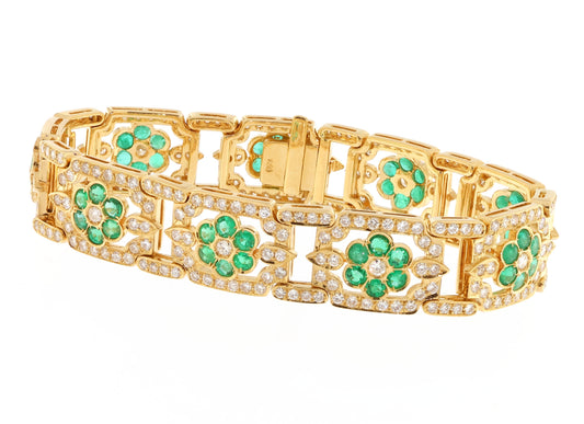 12.45 ct 18kt gold 17.5 cm D-E diamonds + natural emeralds