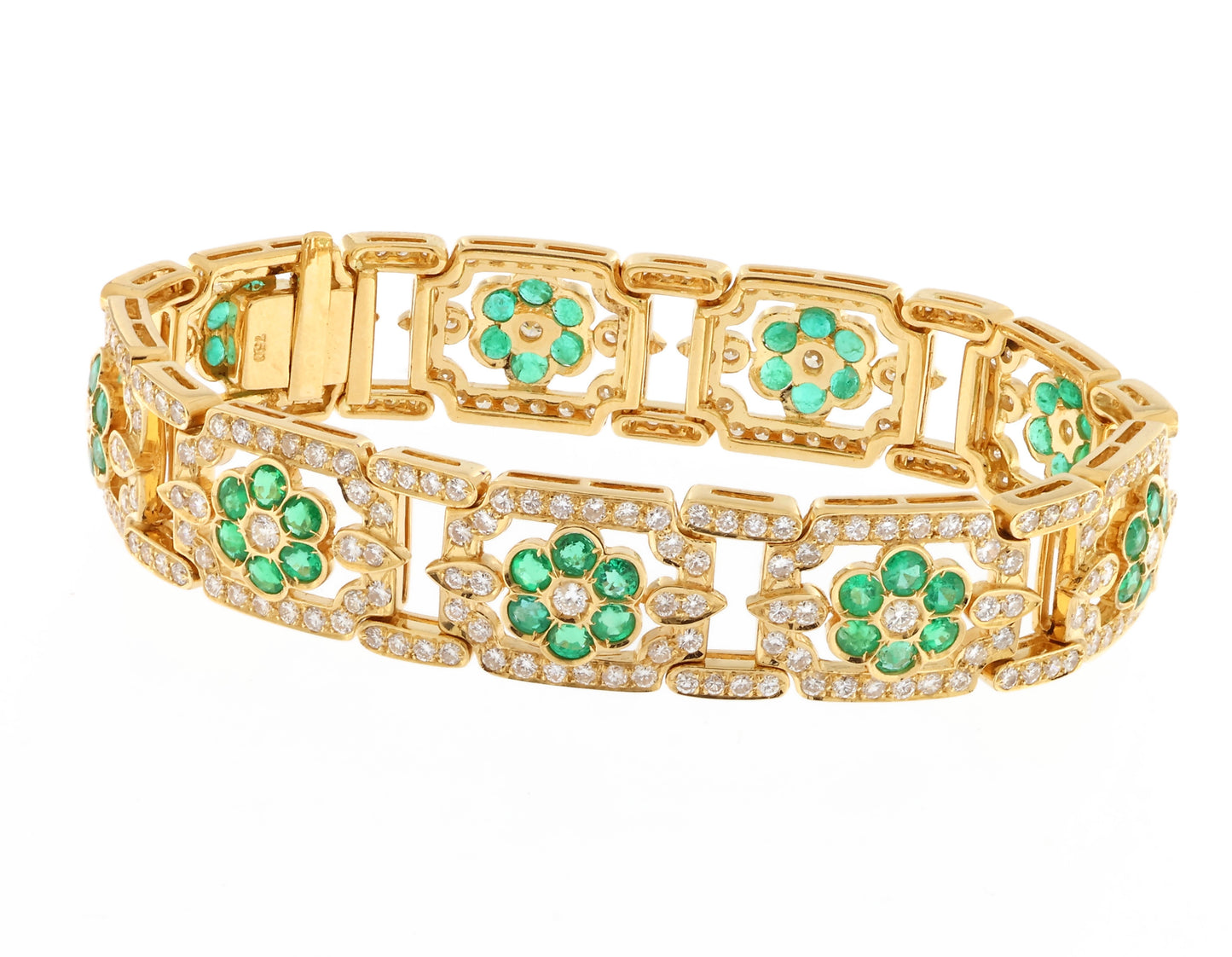 12.45 ct 18kt gold 17.5 cm D-E diamonds + natural emeralds